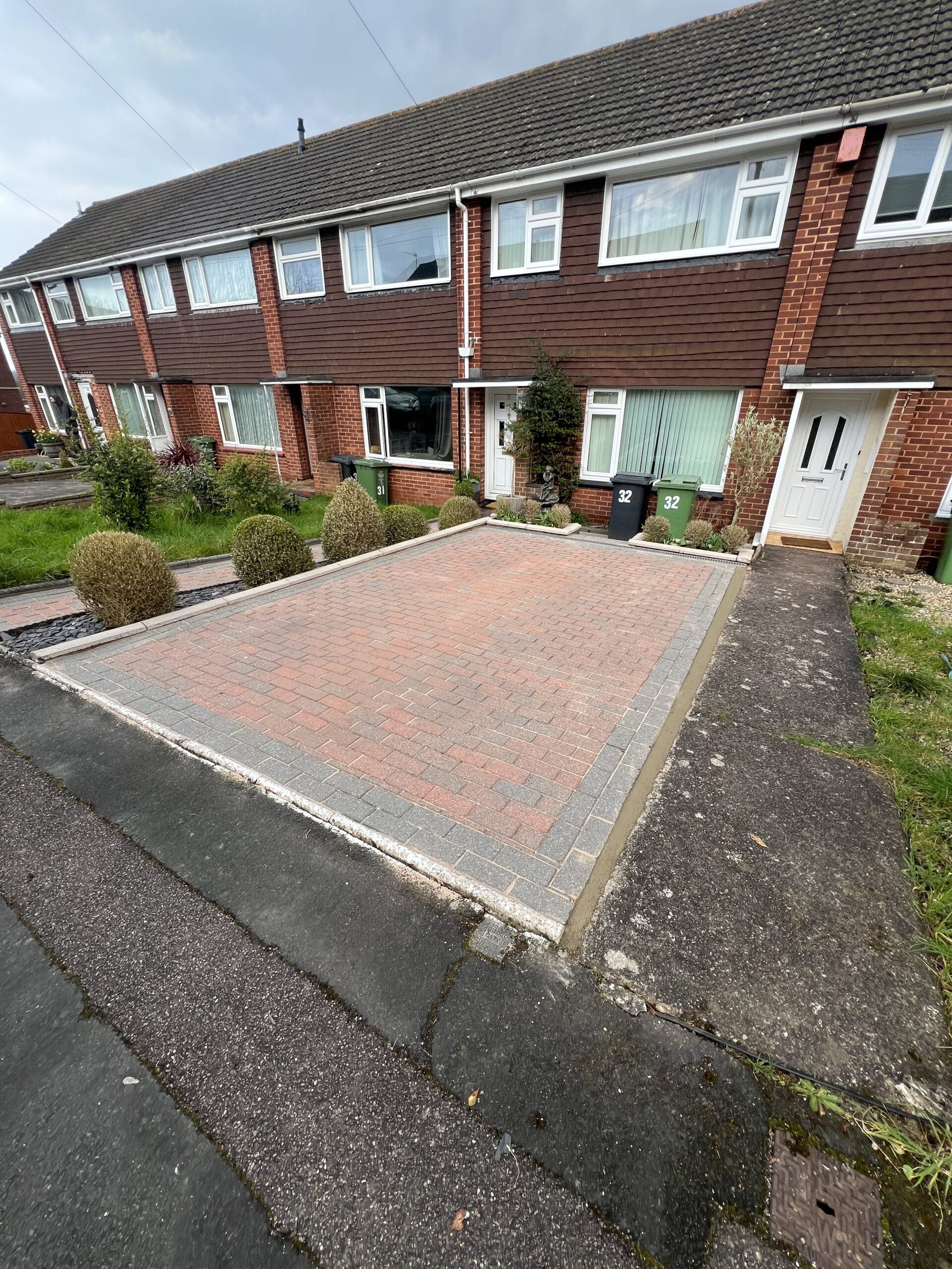 Driveway cleaning in Exeter — AFTER: restored colour and clean surface with stains removed