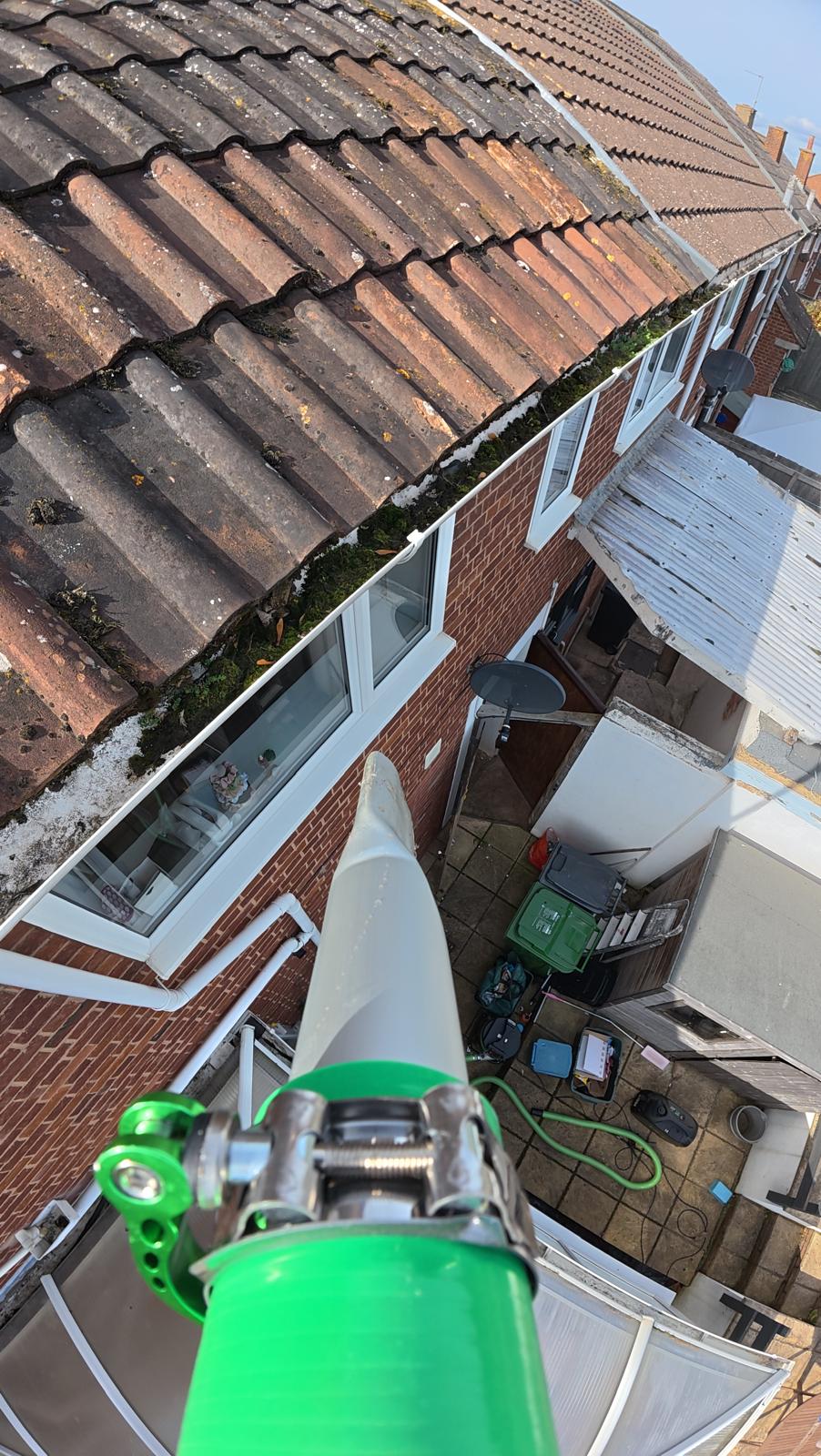 Blocked gutters cleared in Great Torrington — vacuum removal of moss and silt from uPVC gutters